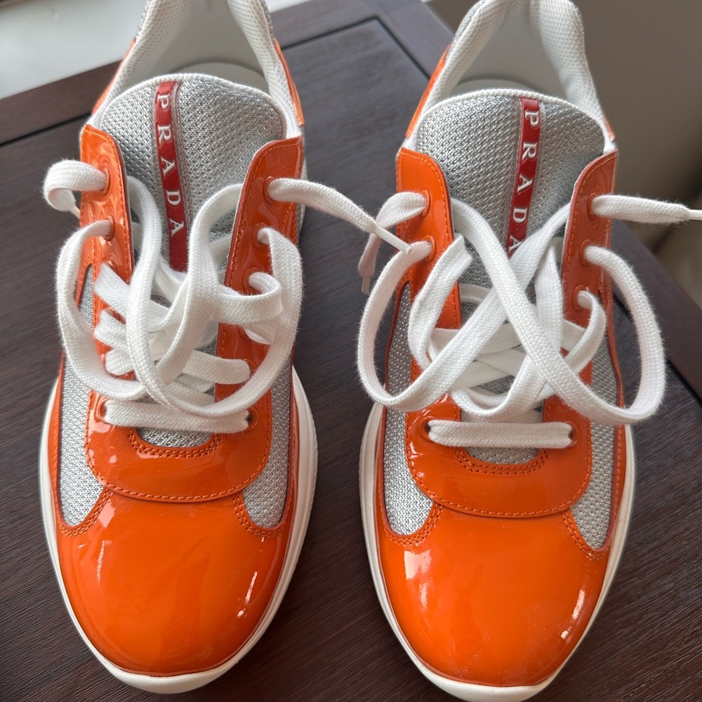 Prada Vibrant Orange and White Sneakers